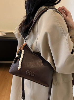 复古腋下包包女士2026新款时尚百搭单肩斜挎包高级感水桶包手拎包