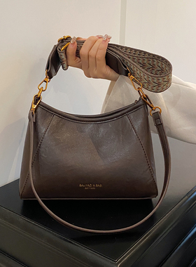 秋冬时尚腋下包包女士2026新款百搭单肩斜挎包高级感水桶包手拎包