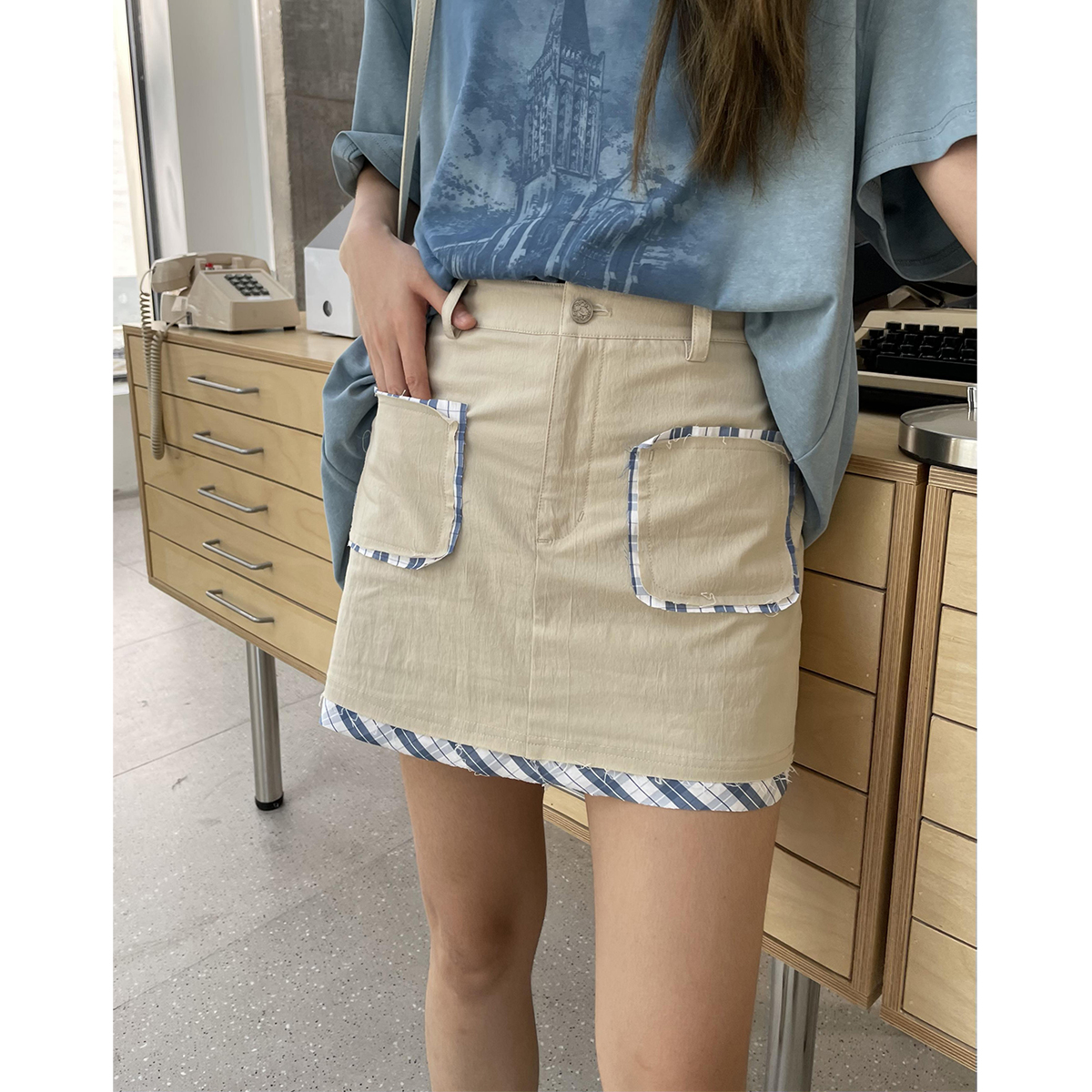 晶咕裙摆边拼格子工装半身裙裤