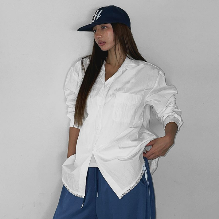 蕾丝花边包边下摆设计宽松衬衫