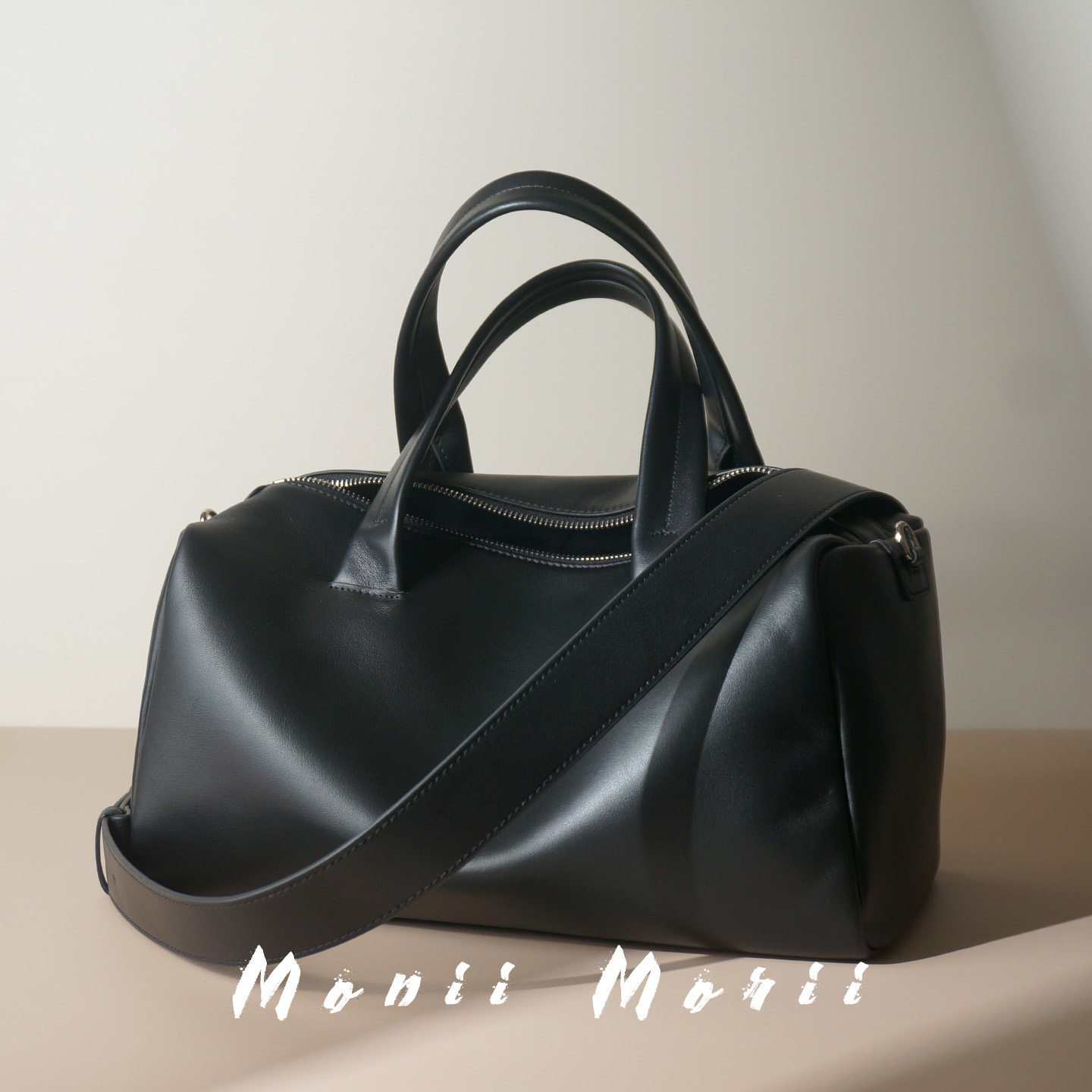 怪兽君真皮枕头包通勤波士顿包