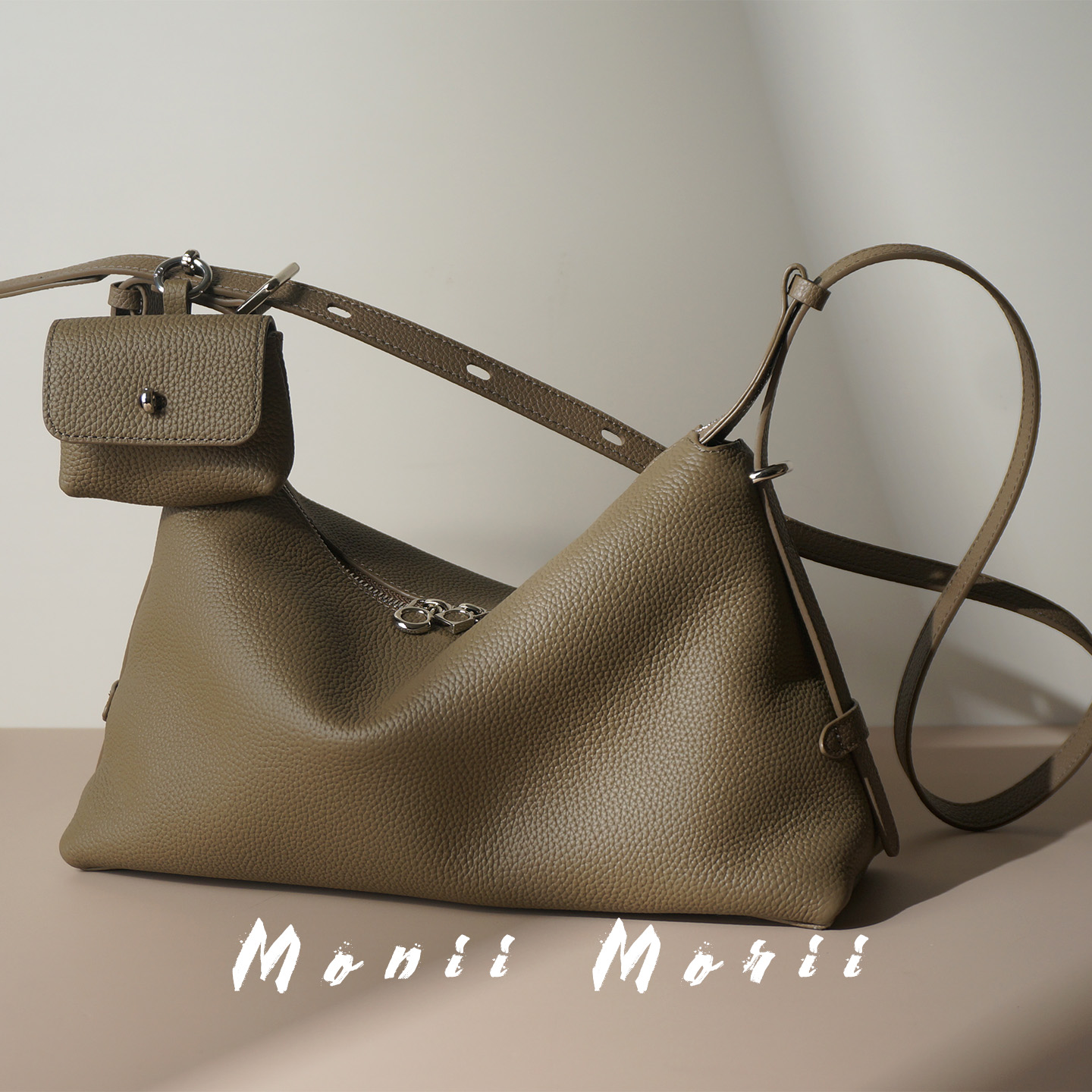 怪兽君2025新款真皮饺子包斜挎包