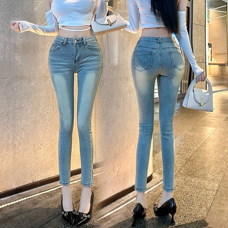 韩片春季新款时尚通勤气质修身高腰显瘦休闲浅蓝色小脚九分牛仔裤