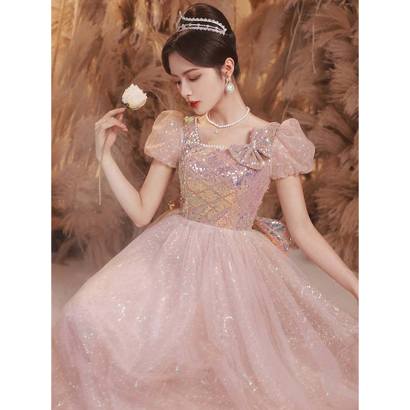 粉色甜美蝴蝶结亮片长款晚礼服裙