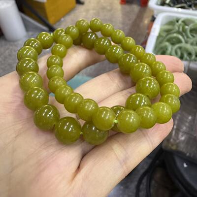 天然岫玉牛油果绿手串