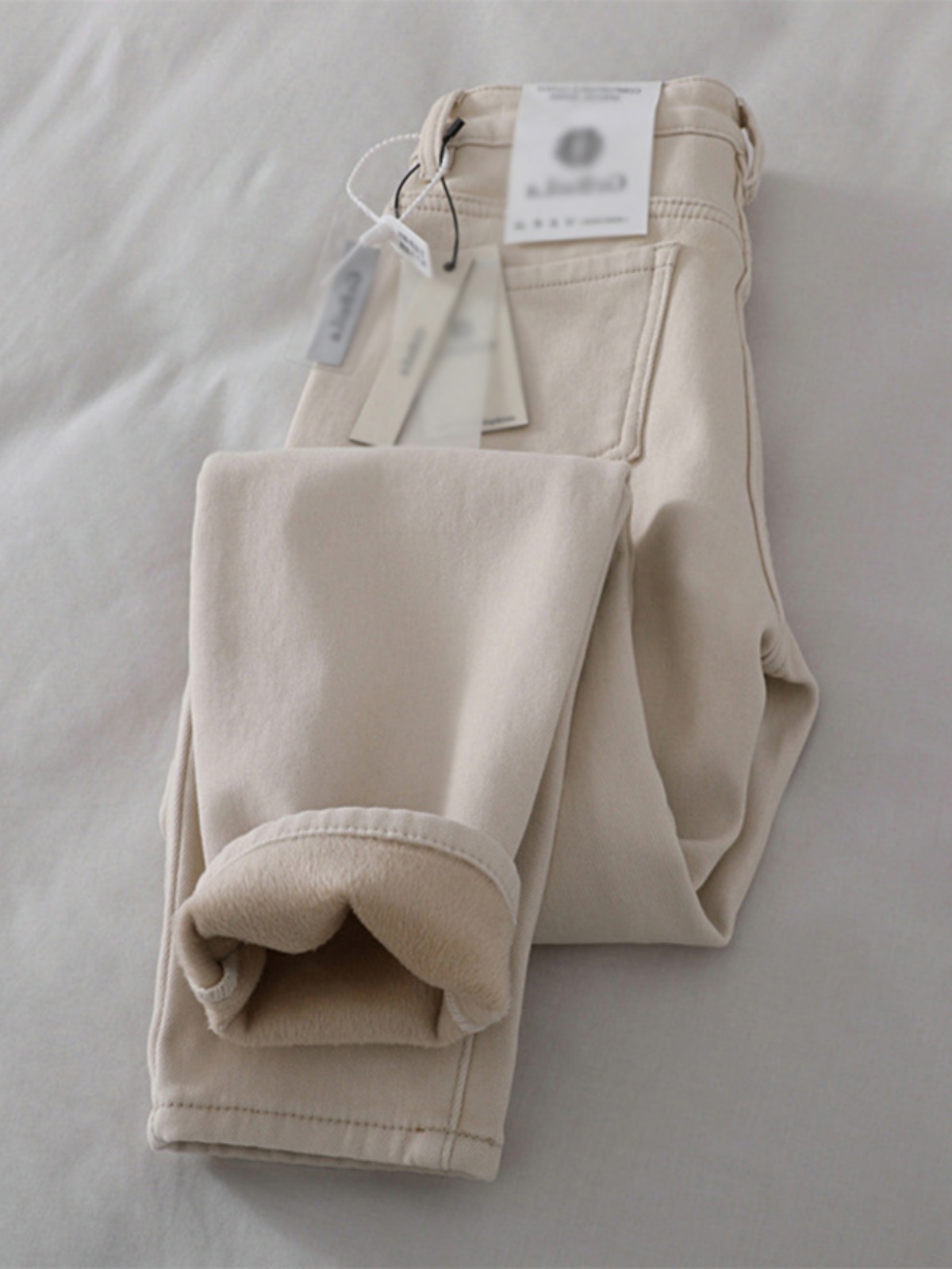 米白加绒牛仔裤女2025春季新款高腰显瘦小脚哈伦裤加厚直筒烟管裤