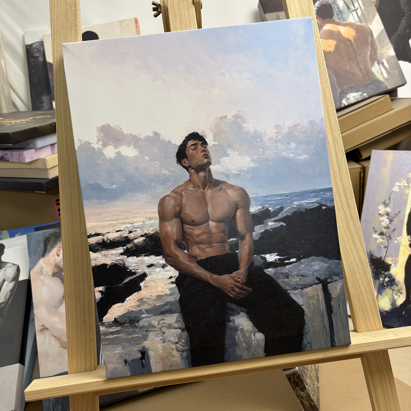 海隅听风写实油画海边礁石肌肉男装饰画黄昏云静谧氛围感艺术挂画