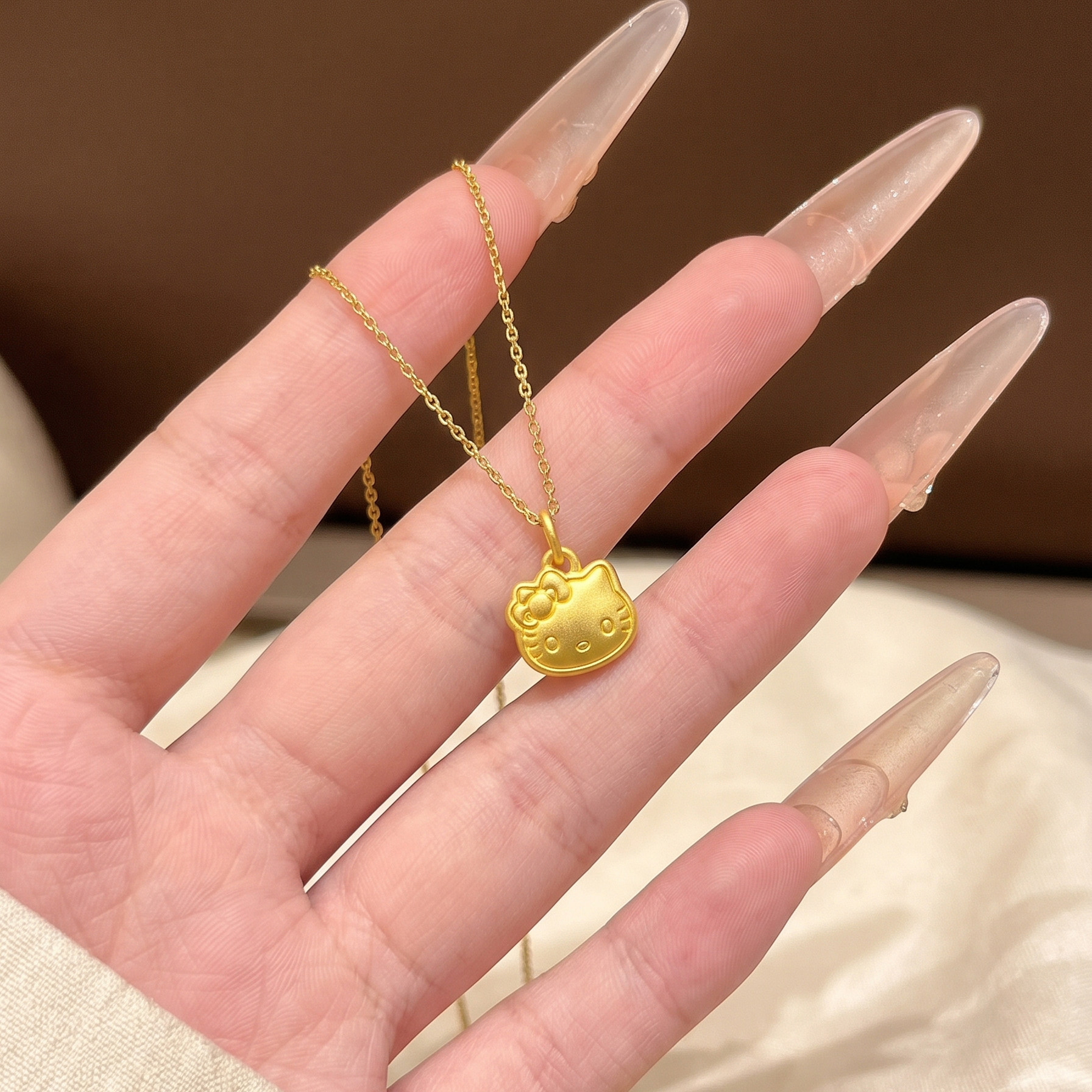添爵 凯蒂猫kt猫黄金吊坠 饼计价黄金吊坠