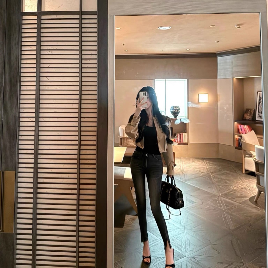 woppei 复古街头破洞做旧毛边设计深灰色高腰拉链牛仔裤秋季新款