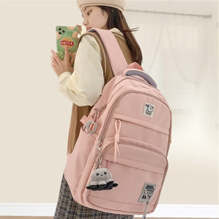 CaringKleing新款高中书包女初中生大容量简约减负校园双肩旅行包