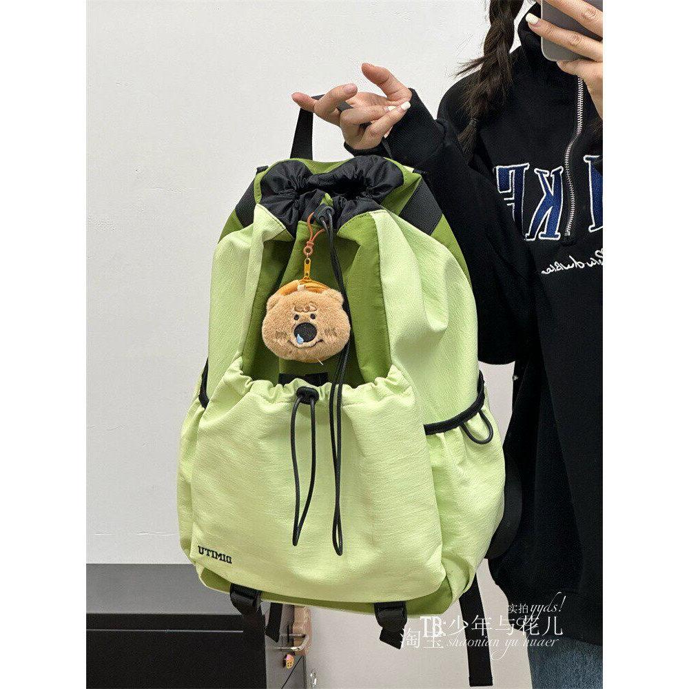 德国户外抽绳双肩包男女通用轻度防水背包羽毛球包高颜值电脑包
