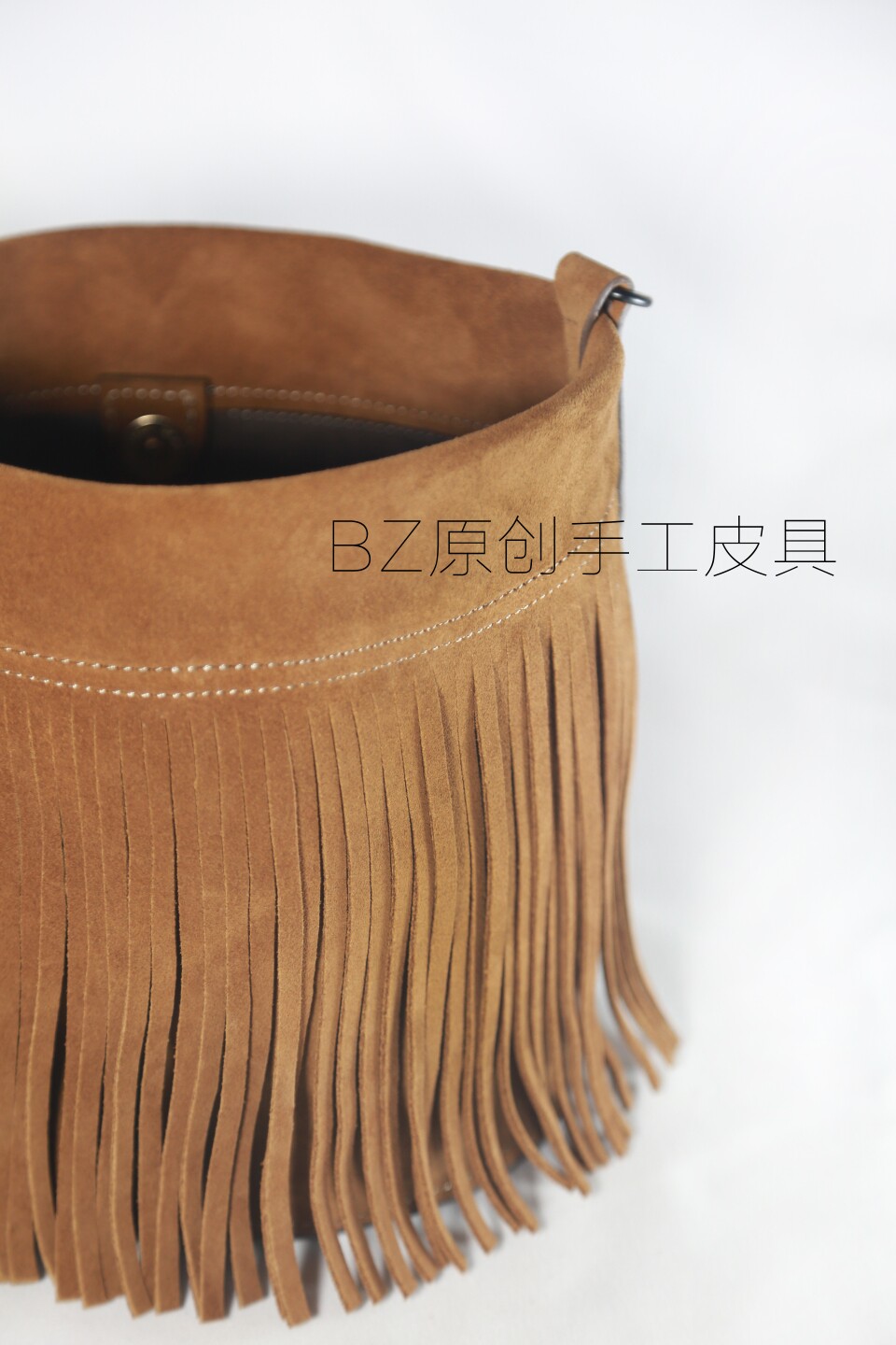 清仓福利特价款原创设计师款时尚头层牛皮翻皮绒流苏水桶手提包包