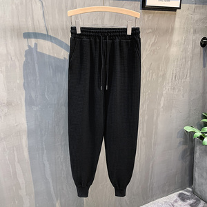 黑色挂拍2023秋装九分裤男青年束脚运动卫裤潮K8005-P55控79