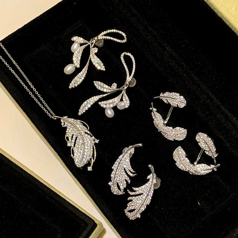 李沁同款悬浮羽毛耳钉女纯银甜美小众独特树叶小卷毛珍珠耳环项链