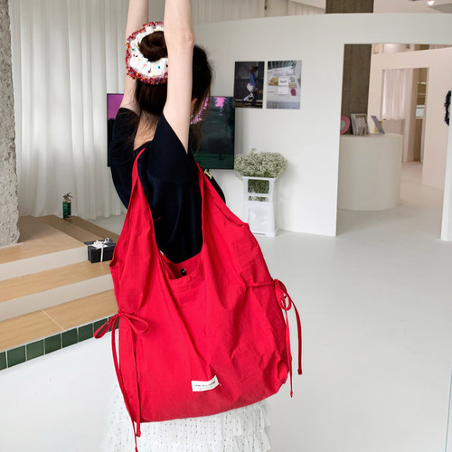 韩版红色帆布包女单肩托特包大容量系带休闲通勤包少女风蝴蝶结带