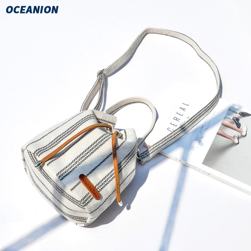 oceanion/容易原创条纹水桶包新款抽绳斜挎包迷你文艺清新布拎包