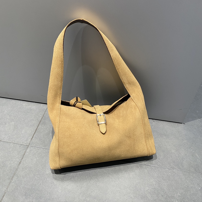 磨砂真皮女包时尚休闲饺子包牛皮法棍包百搭单肩包手提包锁扣9506