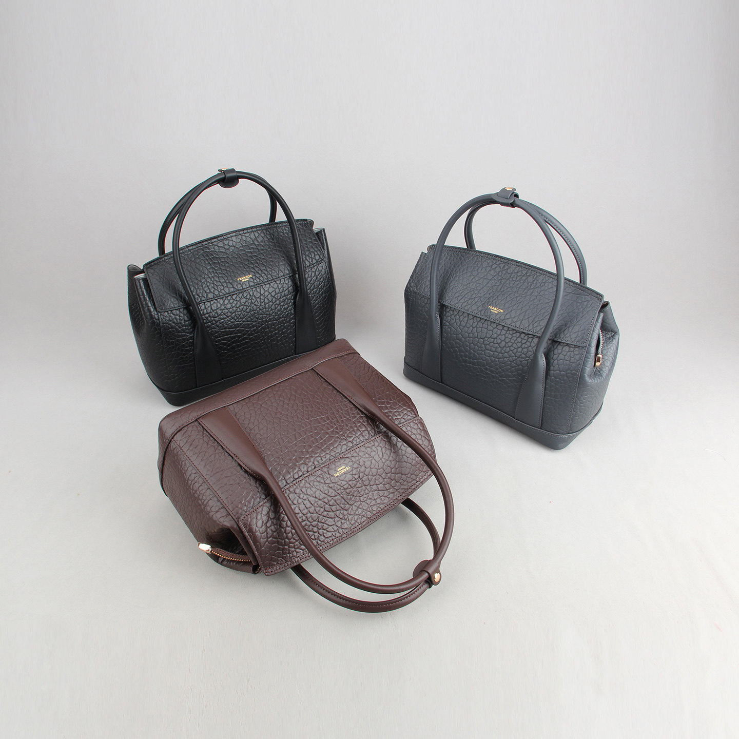 意尔康荔枝纹通勤托特女包
