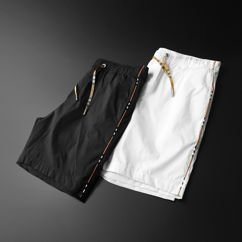 夏季巴宝莉纯色格子短裤男士休闲镂空五分裤青年装直筒中裤沙滩裤