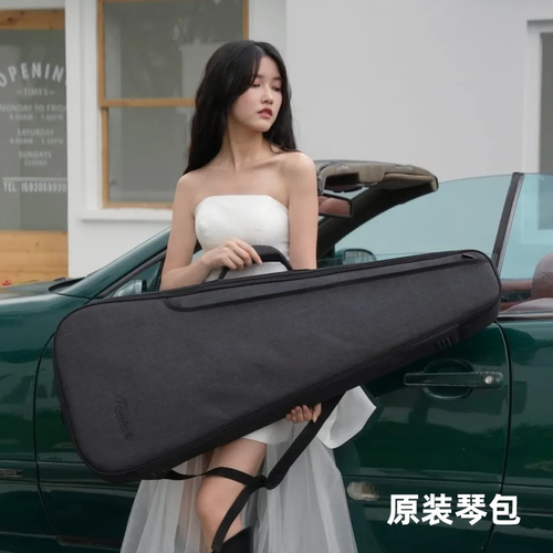 云杉桃花芯民谣吉他蓝盾初学者
