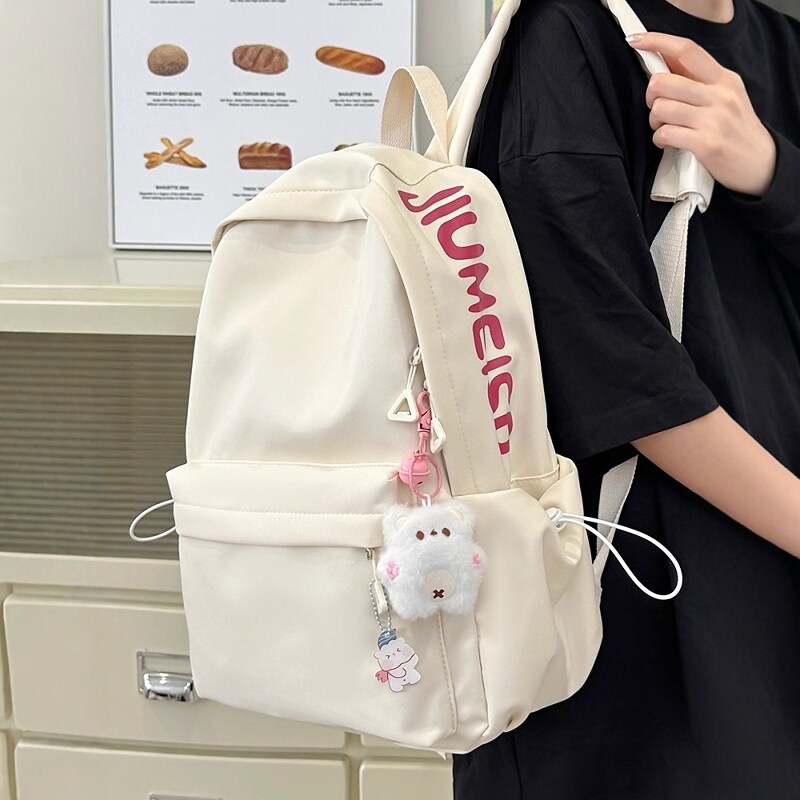 英国NextKiss女童书包2025新款儿童中小学生百搭日系大容量双肩包