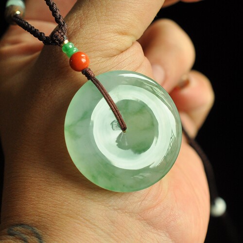 缅甸A货翡翠冰润飘绿花平安扣