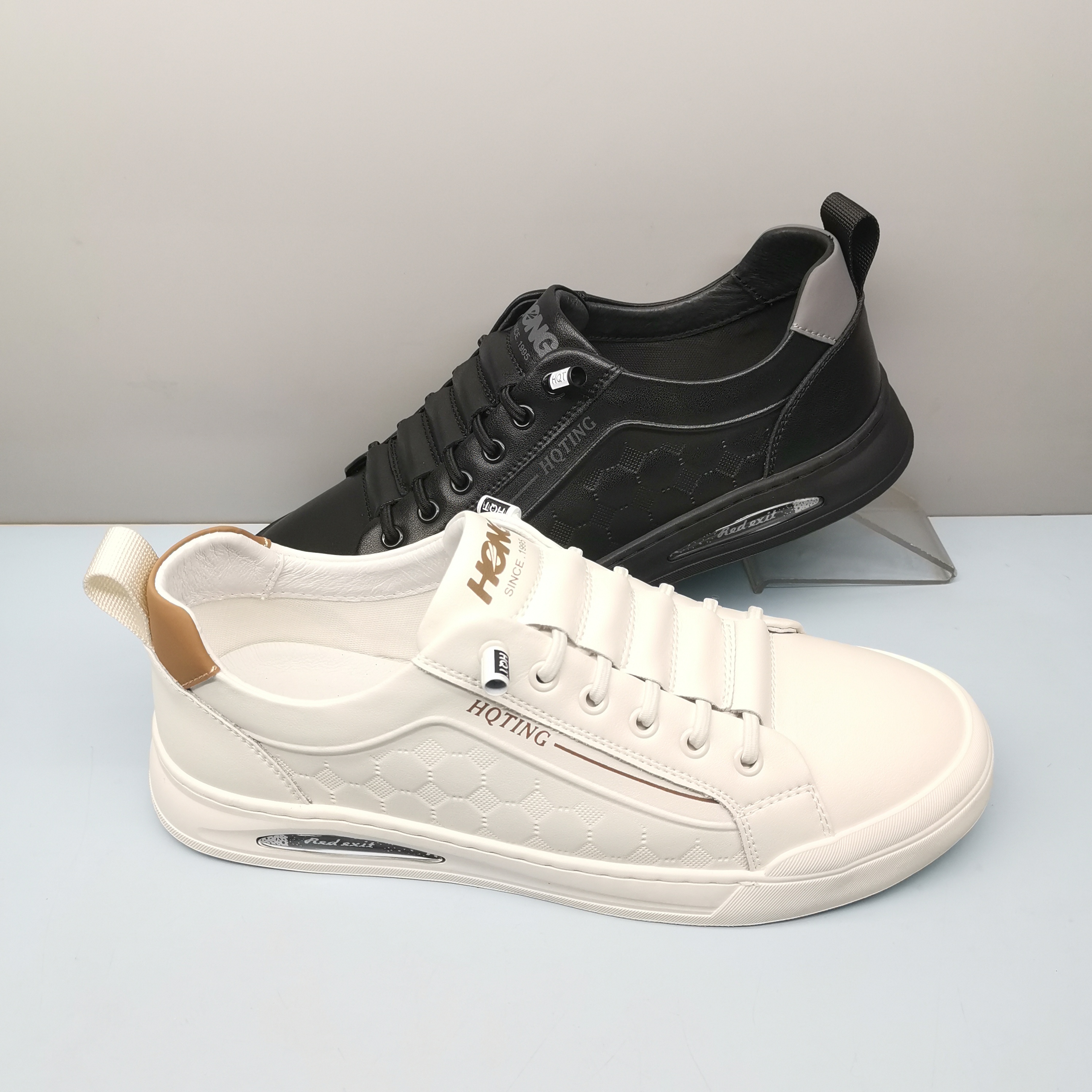 春秋休闲皮鞋红蜻蜓真皮透气板鞋