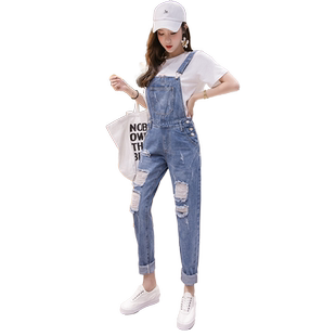 学生破洞九分牛仔背带裤女2026春秋新款减龄宽松连体牛仔直筒长裤