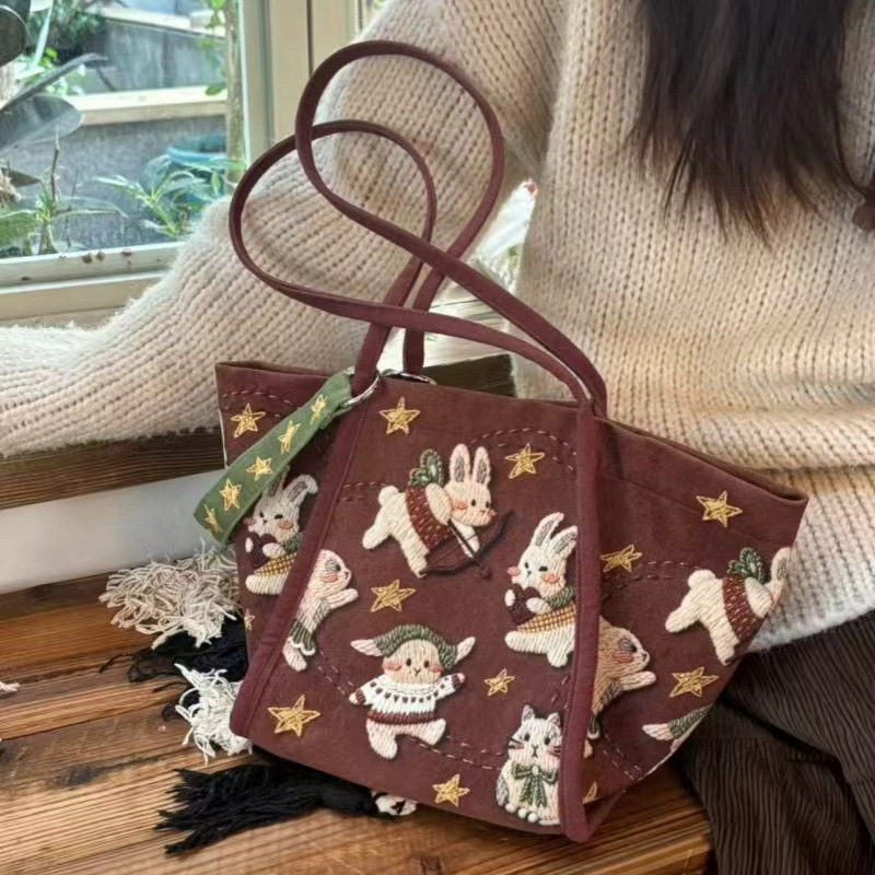2026新款洋气星星兔子插画大容量可爱猫元宝单肩托特包慵懒通勤潮