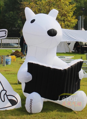 充气卡通阅读白色小狗气模IP定制商场景区引流美陈装饰音乐节活动