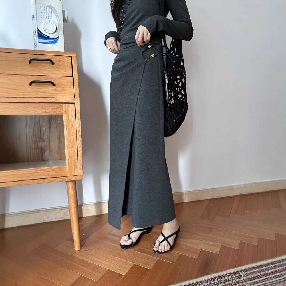 DIGM | 2025秋冬极简优雅串珠不规则松紧腰长裙半身裙女A19582