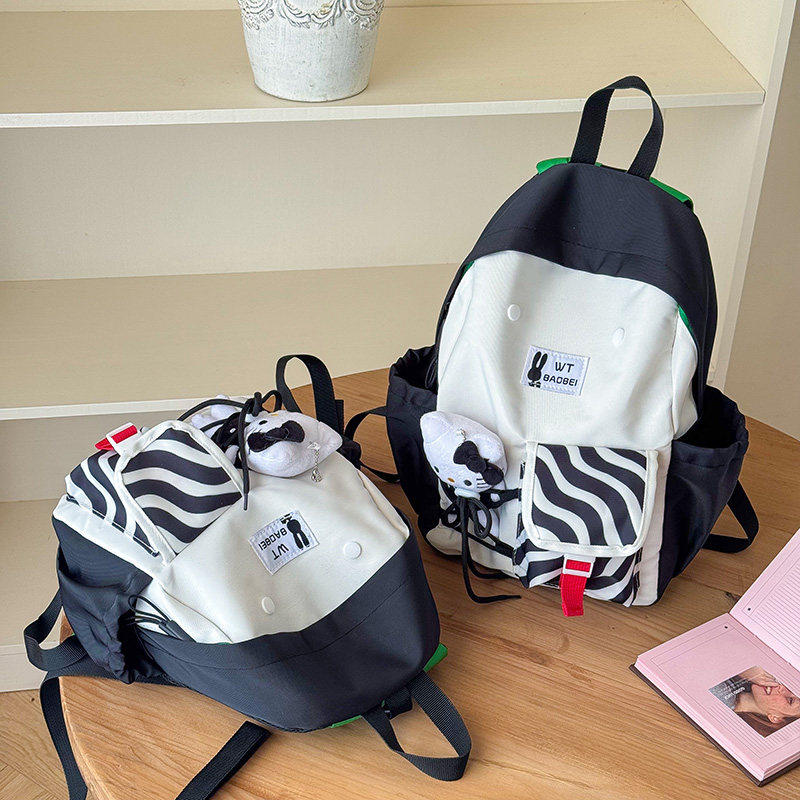 儿童撞色日系拼色双肩包儿童书包轻便男女童大容量百搭新款背包潮