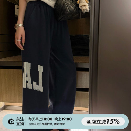 松紧腰裤脚剪裁两色卫裤