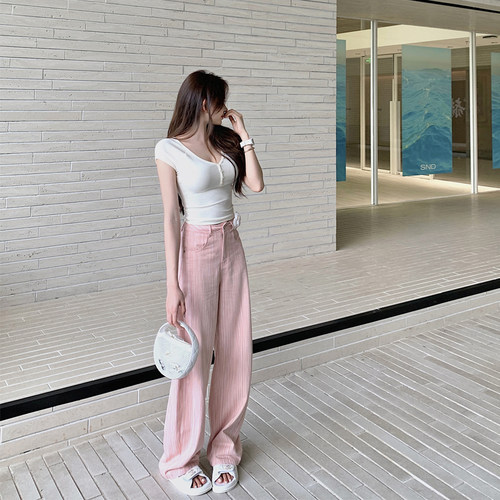 粉色条纹弯刀牛仔裤女春夏设计感