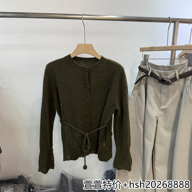 欧洲站2026秋冬新款休闲百搭圆领纯色收腰显瘦下摆镂空羊毛毛衣女