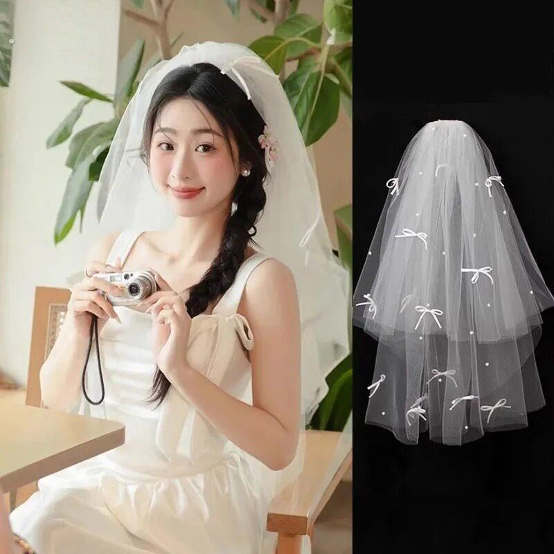 韩式新娘头纱订婚仙美小蝴蝶结珍珠发饰主婚纱造型可爱拍照配饰品