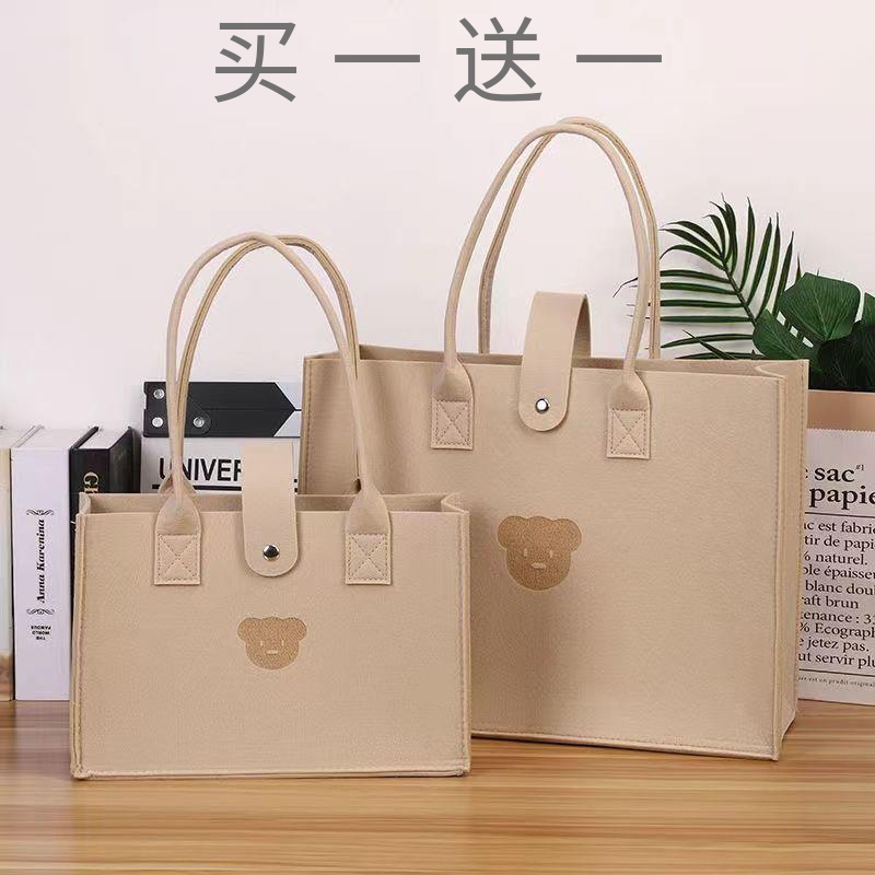 新品毛毡包大容量手提袋定制包妈妈包电脑包时尚百搭购物袋作业袋属于什么档次？