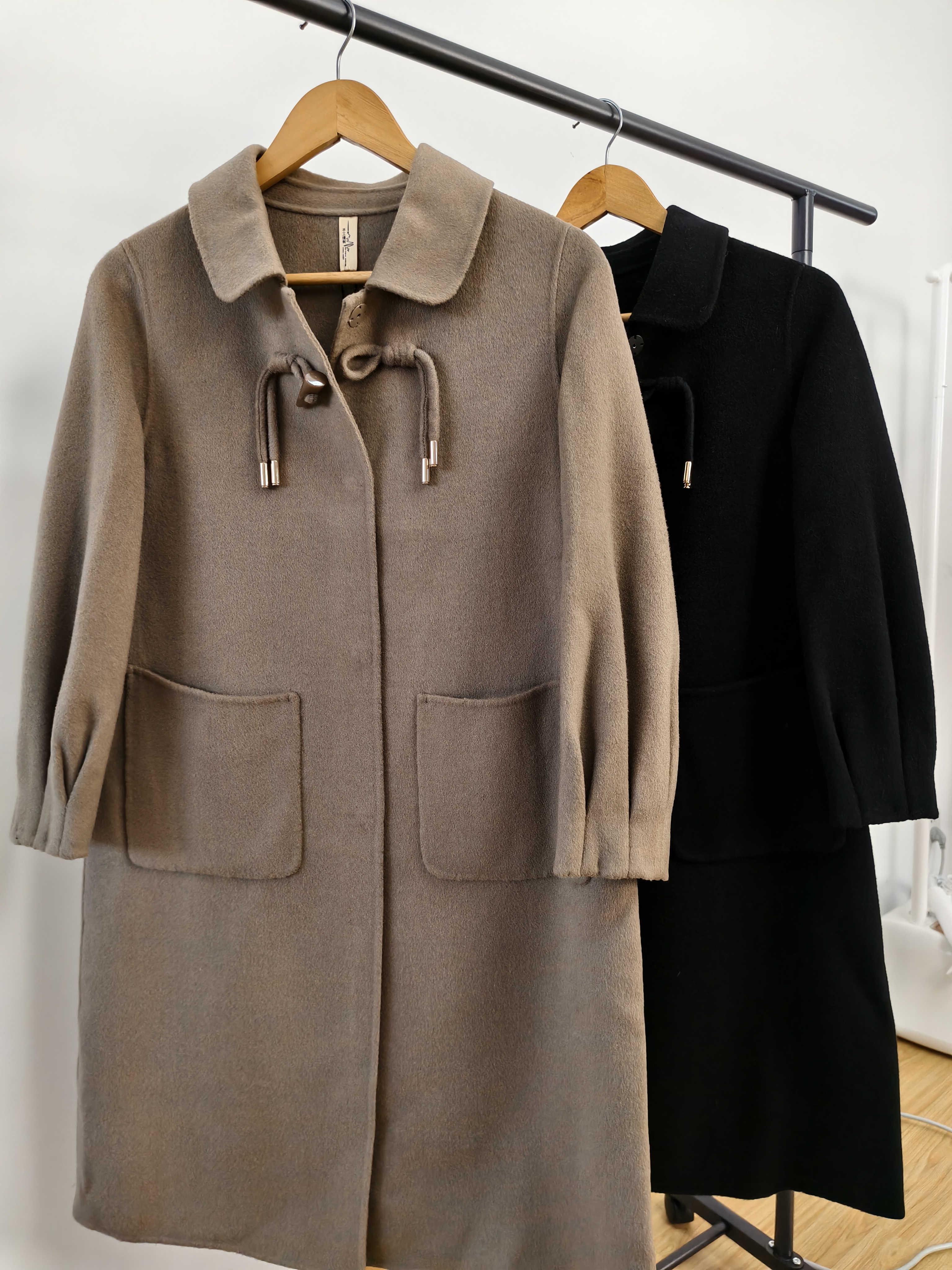 牛角扣双面绵羊毛大衣女中长款2025冬季新款娃娃领双面羊毛外套