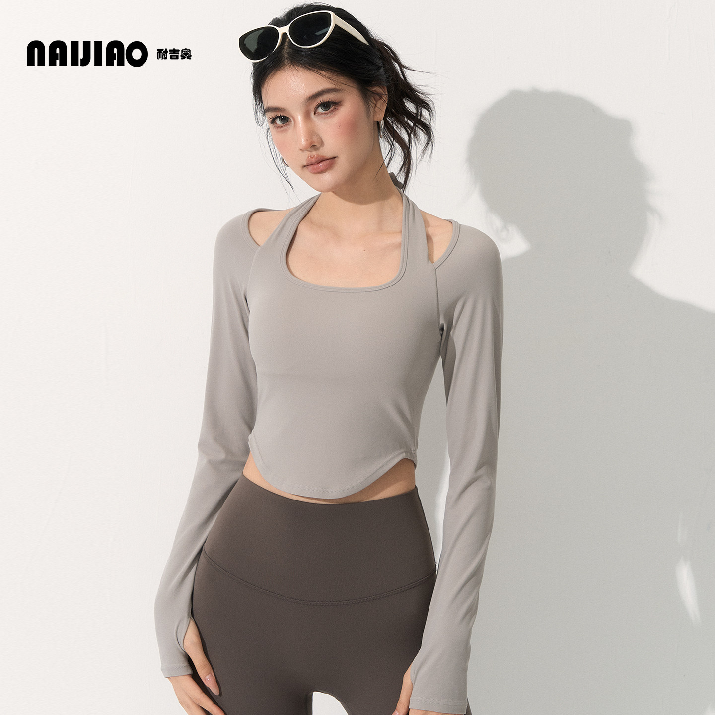 耐吉奥带胸垫运动长袖女假两件时尚健身穿搭短款露脐显瘦上衣秋季
