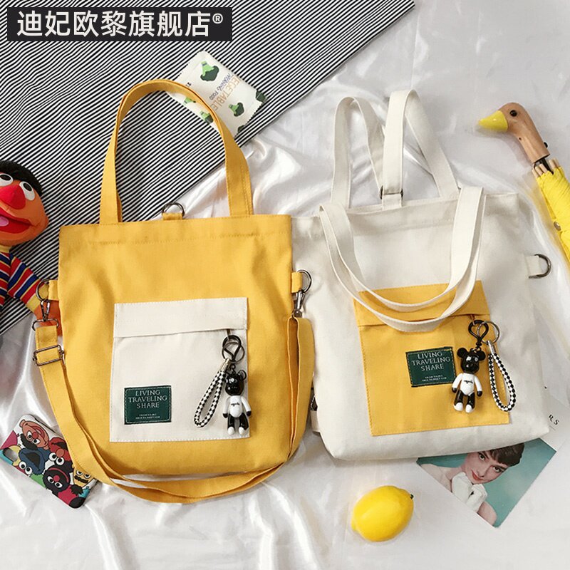 帆布包女2019新款学生双肩包ins超火多用韩版百搭单肩斜跨手提袋