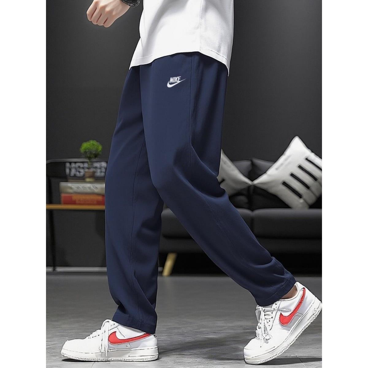 Nike耐克裤子薄款透气直筒裤男子藏蓝色长裤正品纯棉运动裤宽松版