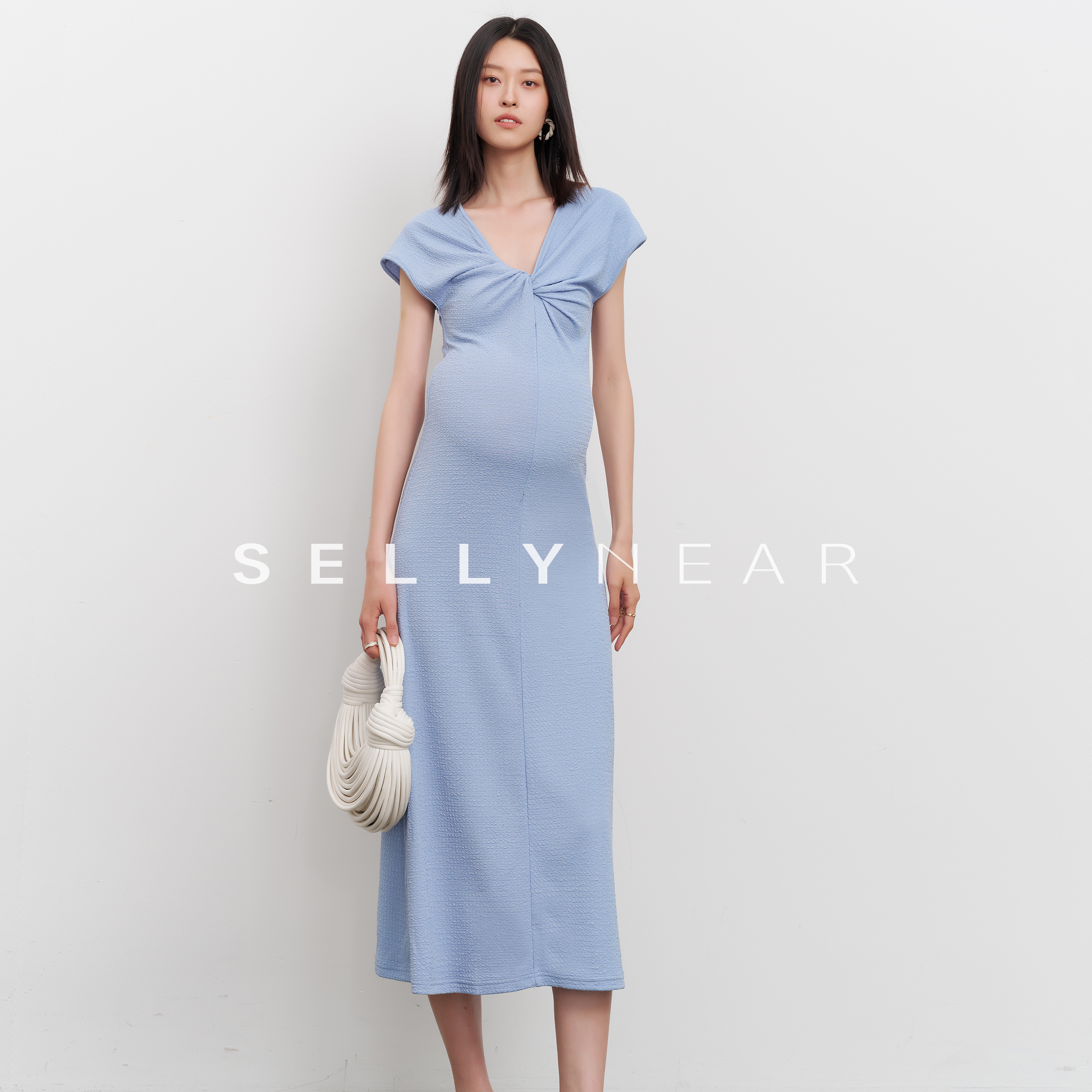 SELLYNEAR肌理感V领扭结连衣裙