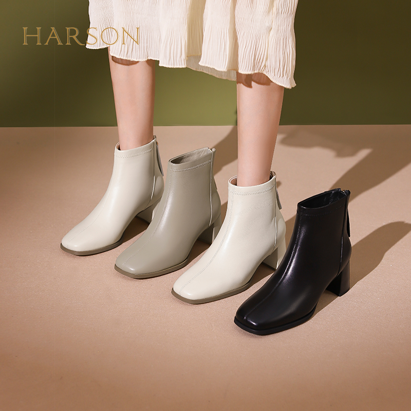 哈森冬季新款羊皮粗跟短靴