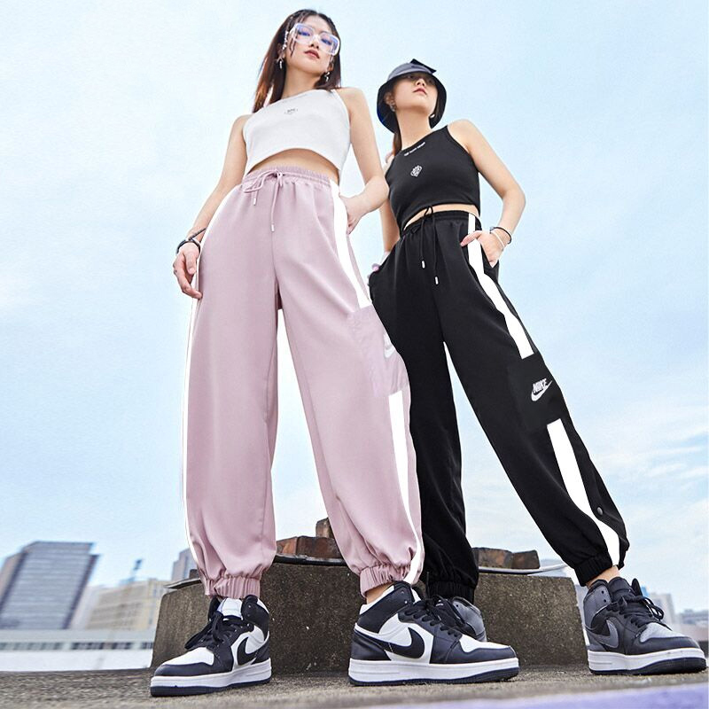 耐克女子跑步休闲束脚梭织长裤