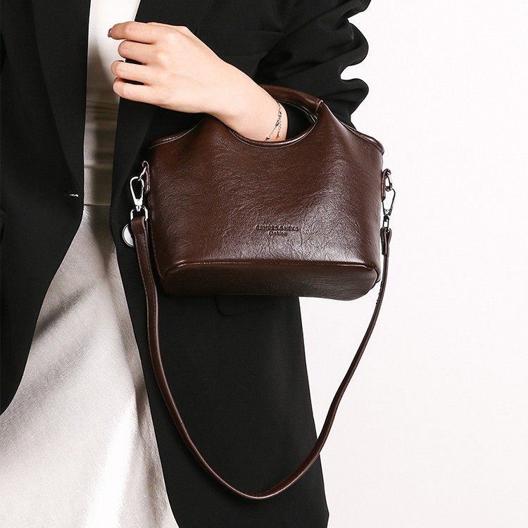 简约复古质感水桶包2026新款女士单肩包手拎休闲上班通勤斜挎包,箱包皮具/热销女包/男包,通用款女包,淘宝优惠券,粉丝福利购,淘宝优惠卷