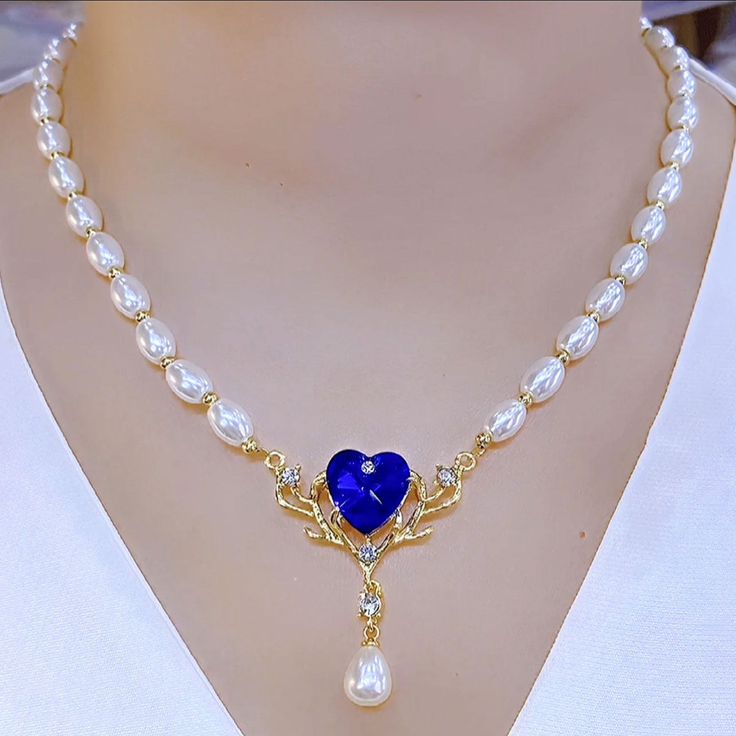 海洋之恋蓝色爱心珍珠项链2025新款女神范轻奢锁骨链百搭气质颈链