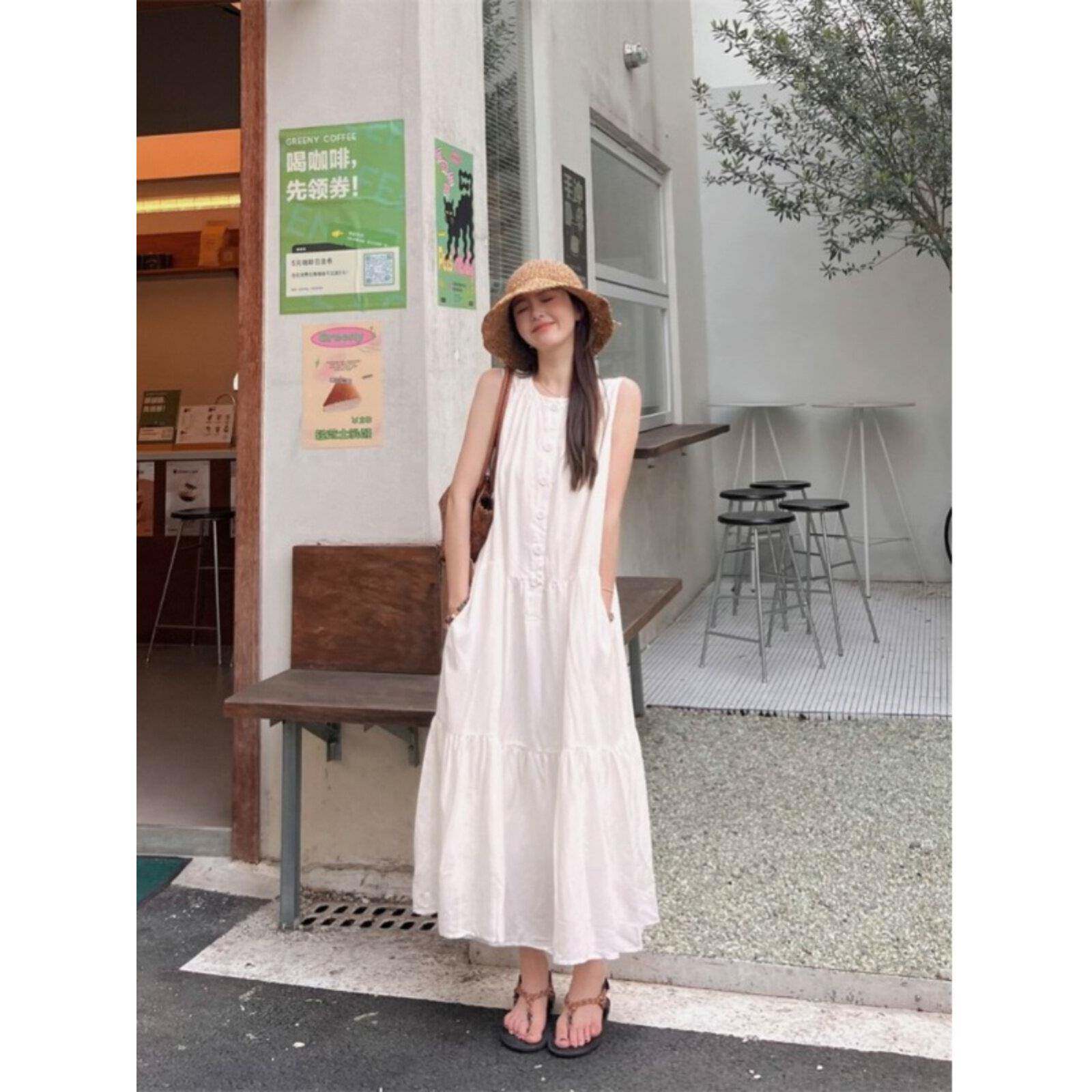 白色无袖背心洋装女夏季2026新款设计感口袋排扣宽松气质长裙子