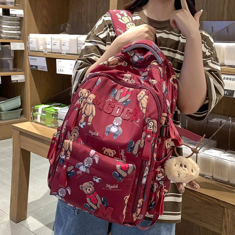 香港书包女韩版小学生初中生揹包印花高中学生大学生酒红色双肩包