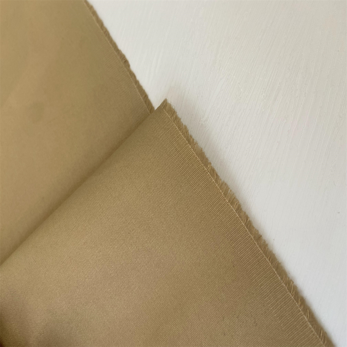 卡其色日本进口棉100%纱卡面料设计师休闲风衣裤子亲肤微挺布料