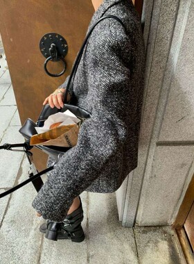 九1226韩国东大门大衣区atmosphere-8730950人气瑞丽春季档口通勤